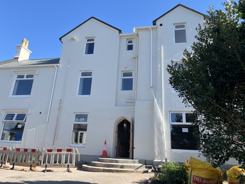 First look at the new homes at Brampton Court, showing modern new-built homes with white façades