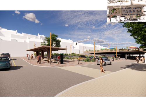 A view of the bus shelter and entrance to the car park.