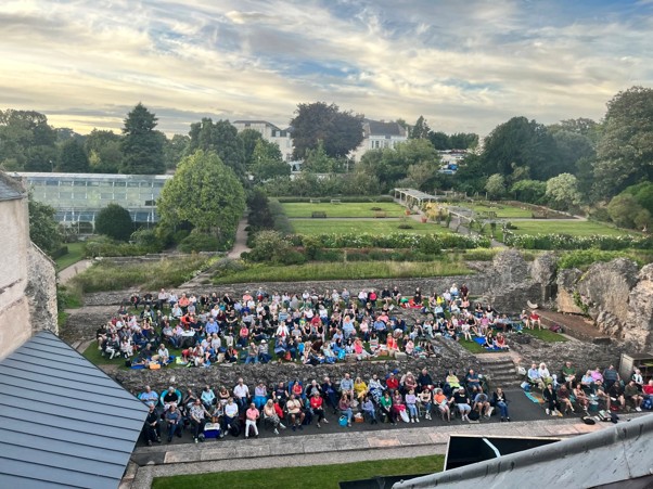 Crowds watching the Outdoor Theatre performance outside Torre Abbey